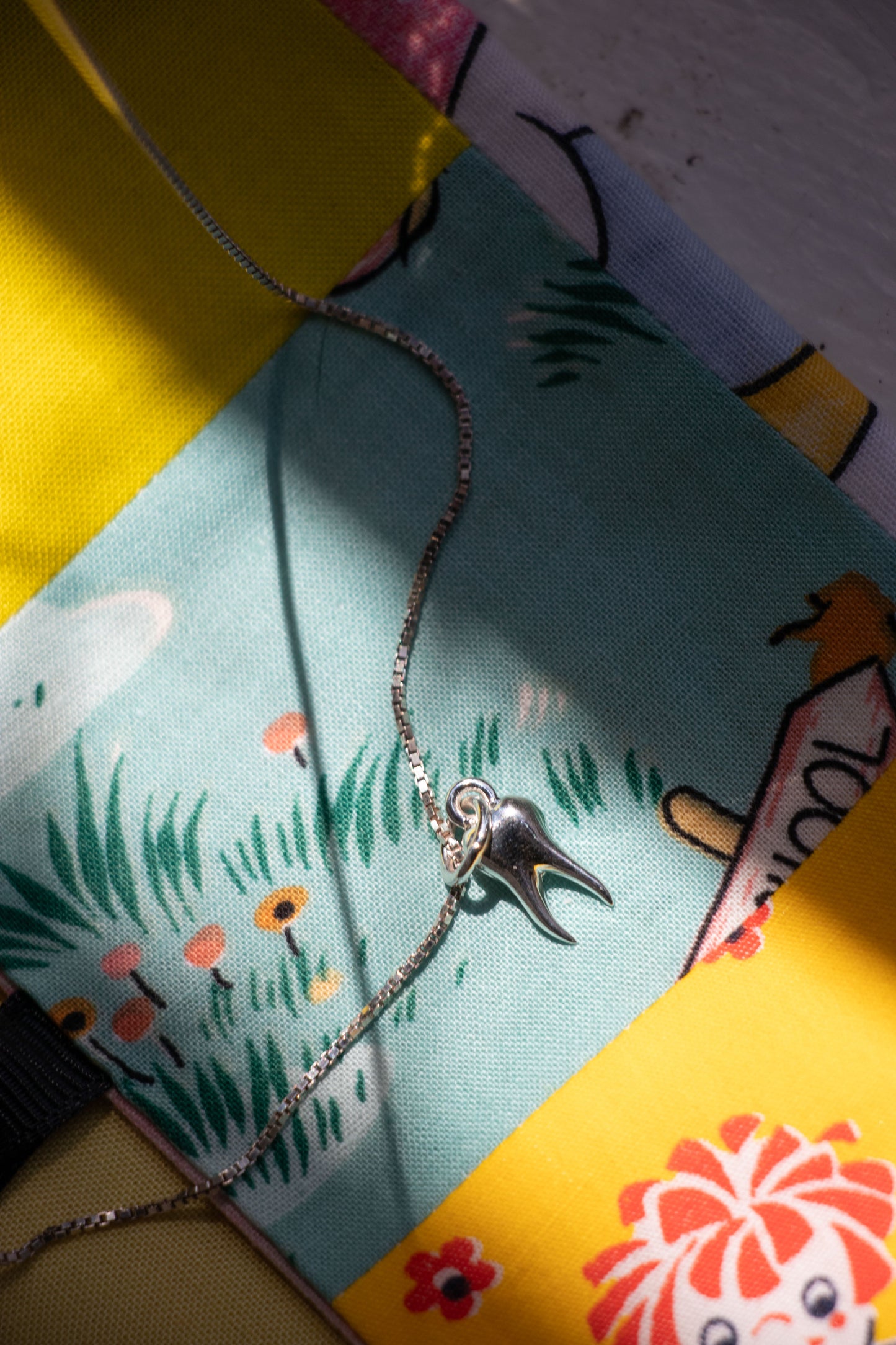 Sterling Silver Pre-Molar Charm