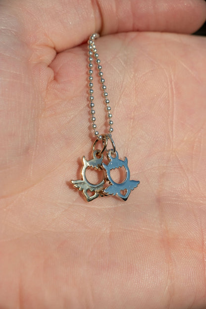 14k gold and sterling devangel charm miniature angel pendant queer trans jeweler lettuce goods 14karatdoll styled on a chain